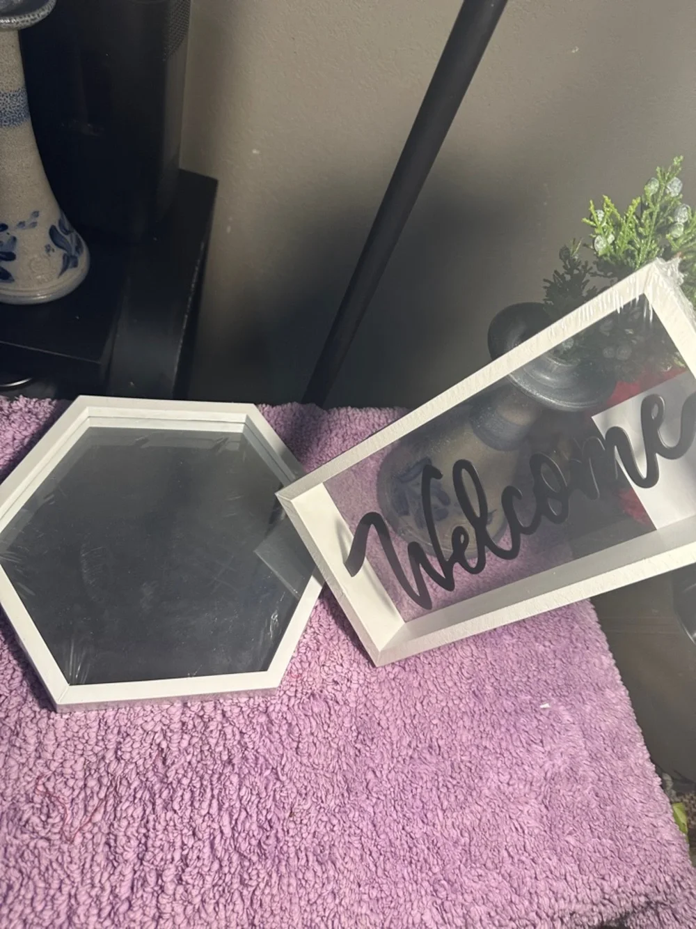 White 'Welcome' Framed Sign with White Hexagon Mirror